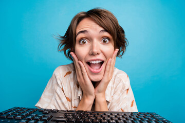 Photo of crazy charming woman hacker cyber administrator system developer two hands touch face...