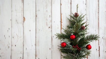 Festive Christmas theme with tree on white wood backdrop from above