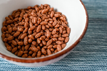 Puffed rice cereal with chocolate in a bowl