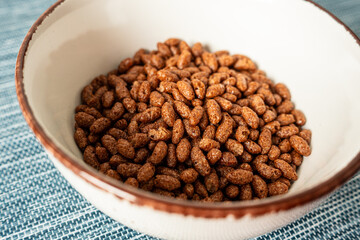 Puffed rice cereal with chocolate in a bowl