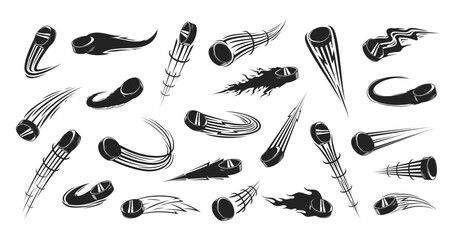 Vector black and white flying ice hockey pucks with motion trails