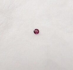 Garnet gemstones violet round shape front
