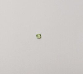 Peridot gemstones green round shape front
