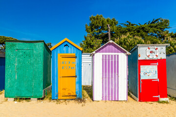 Beach huts of La Boirie beach in Saint-Denis-d'Oleron, France on a summer day