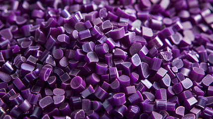 Obraz premium polymer masterbatch granules isolated on a purple texture background for banner design for product profile photos in industrial plastic company catalogues
