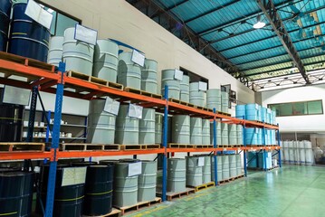 Chemical storage warehouse. Containers for chemical liquids. Warehouse system. Toxic barrels are...