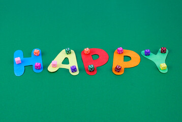 Colorful cubes with happy expressions over word happy