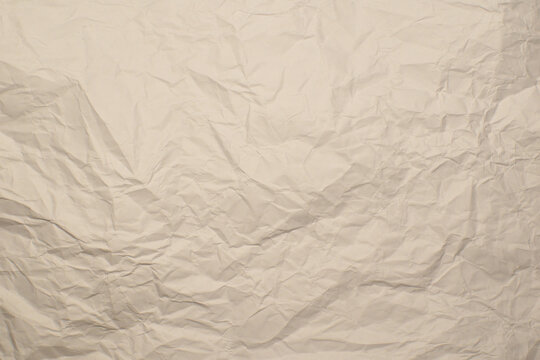 Papel blanco arrugado para usar como fondo para dise&ntilde;o con espacio de copia para texto o imagen.