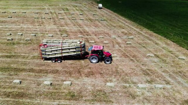 Bale wagon automatically collects square bales.