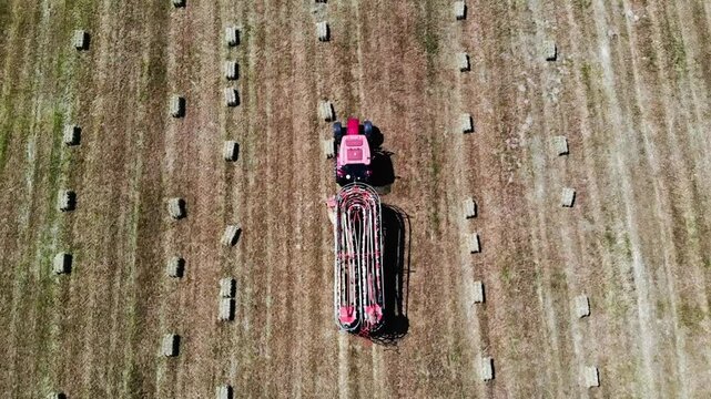 Bale wagon automatically collects square bales.