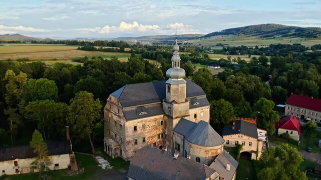 Sarny Palace (Schloss Scharfeneck) - 16th Century Palace In Sarny, Klodzko County, Poland. aerial orbiting shot