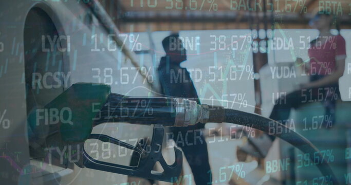Image of stock market data processing over nozzle pump refueling the car tank at gas station