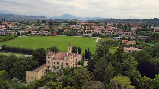 Aerial view with a drone of castle at Lazise, Garda lake. Part of Lake Garda in Northern Italy