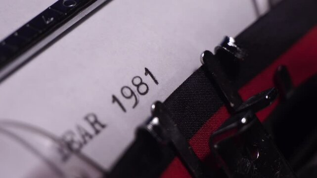 Year 1981, Typing on Blank White Paper in Vintage Typewriter, Close Up