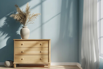 Dried flowers in vases stand on a chest of drawers against a wall,design, home decoration, minimalism	