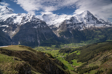 beautiful landscape of alpine at Grindelwald first and we can hike at cliff walk and play paragliding and many adventure activities here Switzerland 