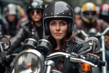 Woman in a black helmet and leather jacket stands out in a crowd of bikers at a motorcycle rally event