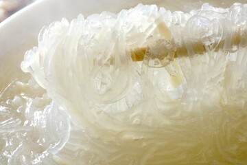 Fototapeta premium Winter noodles picked up with chopsticks It is a common snack in Taiwan