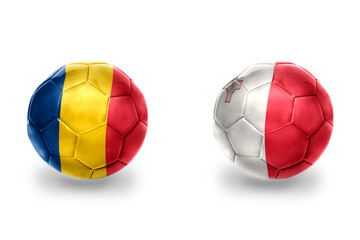 football balls with national flags of malta and romania,soccer teams. on the white background.