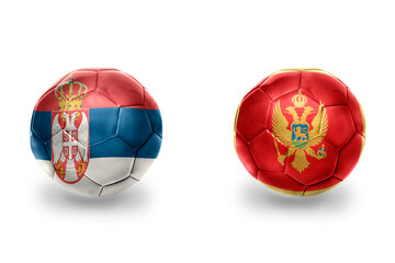 Obraz premium football balls with national flags of montenegro and serbia ,soccer teams. on the white background.