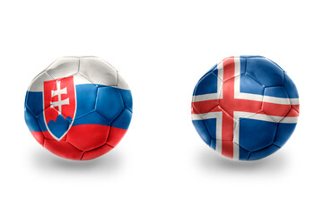 football balls with national flags of iceland and slovakia ,soccer teams. on the white background.