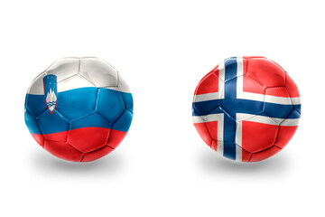 Obraz premium football balls with national flags of norway and slovenia ,soccer teams. on the white background.