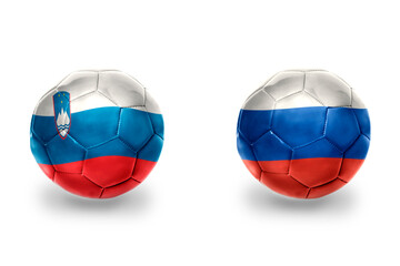 Fototapeta premium football balls with national flags of russia and slovenia ,soccer teams. on the white background.