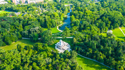 A stunning aerial view of Park Maksimir in Zagreb, showcasing its vast greenery, beautiful lakes,...