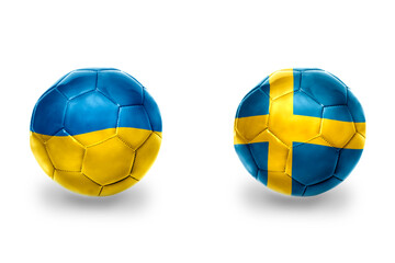 Fototapeta premium football balls with national flags of sweden and ukraine,soccer teams. on the white background.