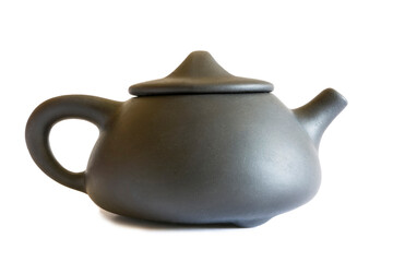 Clay teapot for brewing tea, black on a white background.
