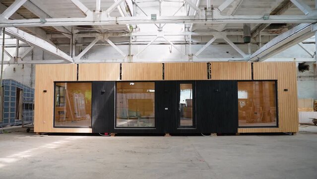 Modern mobile prefabricated modular home at a construction site