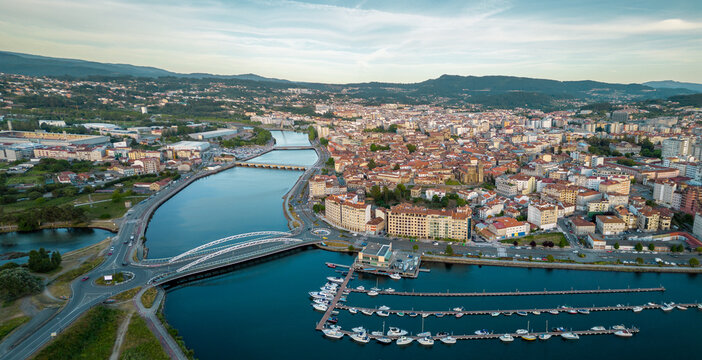 Panoramic aerial view of Spanish Galician city PONTEVEDRA. View of old town center with historic buildings. Cathedral of Pontevedra. River Lerez crossing the city. Famous travel destination.