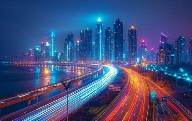 Obraz premium Highway with light trails leading to a city at night