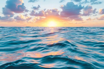 Fototapeta premium Sunset glow over tranquil ocean waves