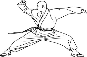 A man in a karate uniform is in a pose, ready to strike