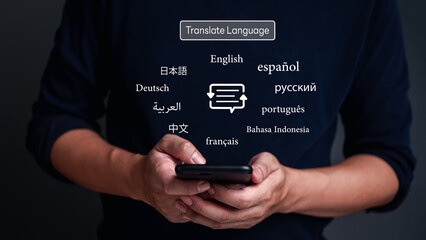 Hands holding smartphone with multilingual text icons. Translation technology concept. App for...