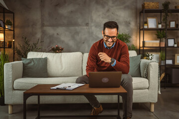 Adult businessman work from home on laptop