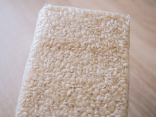 Packaging of rice for making risotto. Vacuum packed to preserve the quality of rice grains. A modern way to store cereals. Rectangular packaging for placing inside a cardboard box.