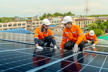 engineer men inspects construction of solar cell panel or photovoltaic cell by electronic device. Industrial Renewable energy of green power. factory worker working on tower roof.