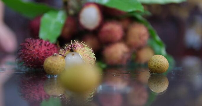 Rambutan Nephelium lappaceum with natural background. Rambutan is the exotic fruit from indonesia. Juicy and sweet. one of the cheapest fruit from Indonesia. word rambut meaning 