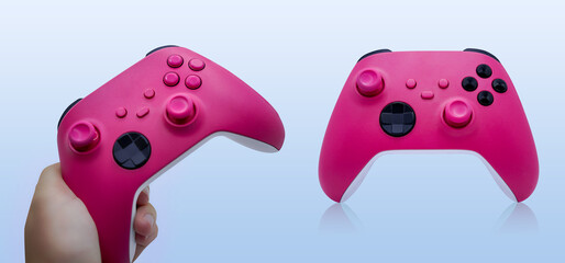 Pink controller for video gaming.