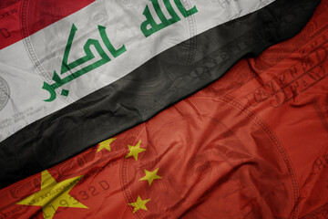 waving colorful flag of iraq and national flag of china on the dollar money background. finance...