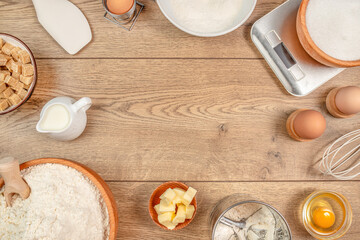 Baking and cooking ingredients flour eggs Kitchen utensils. Text space, top view