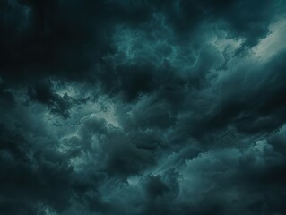 vThe dark sky with heavy clouds converging and a violent storm before the rain.Bad or moody weather sky and environment. carbon dioxide emissions, greenhouse effect, global warming, climate