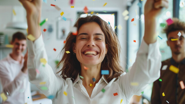 Joyful woman celebrating with confetti.