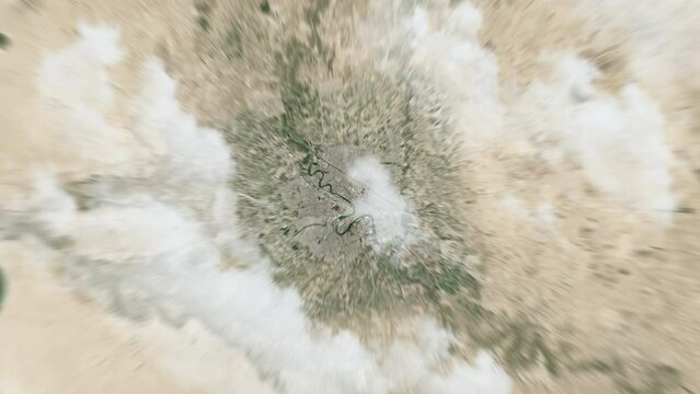 Zooming on Baghdad, Iraq. Earth zoom in from outer space to city. The animation continues by zoom out through clouds and atmosphere into space. View of the Earth at night. Images from NASA. 4K