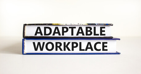 Adaptable workplace symbol. Concept words Adaptable workplace on beautiful books. Beautiful white paper background. Business Adaptable workplace concept. Copy space.