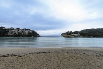 Tranquil Cala Galdana Beach with Coastal Cliffs, Menorca