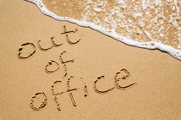 Out of Office Inscription in the Sand