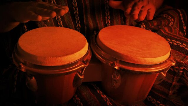 Hand Drumming By Camp Fire
